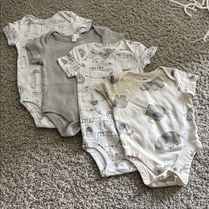 Bundle of 4 shortly onesies